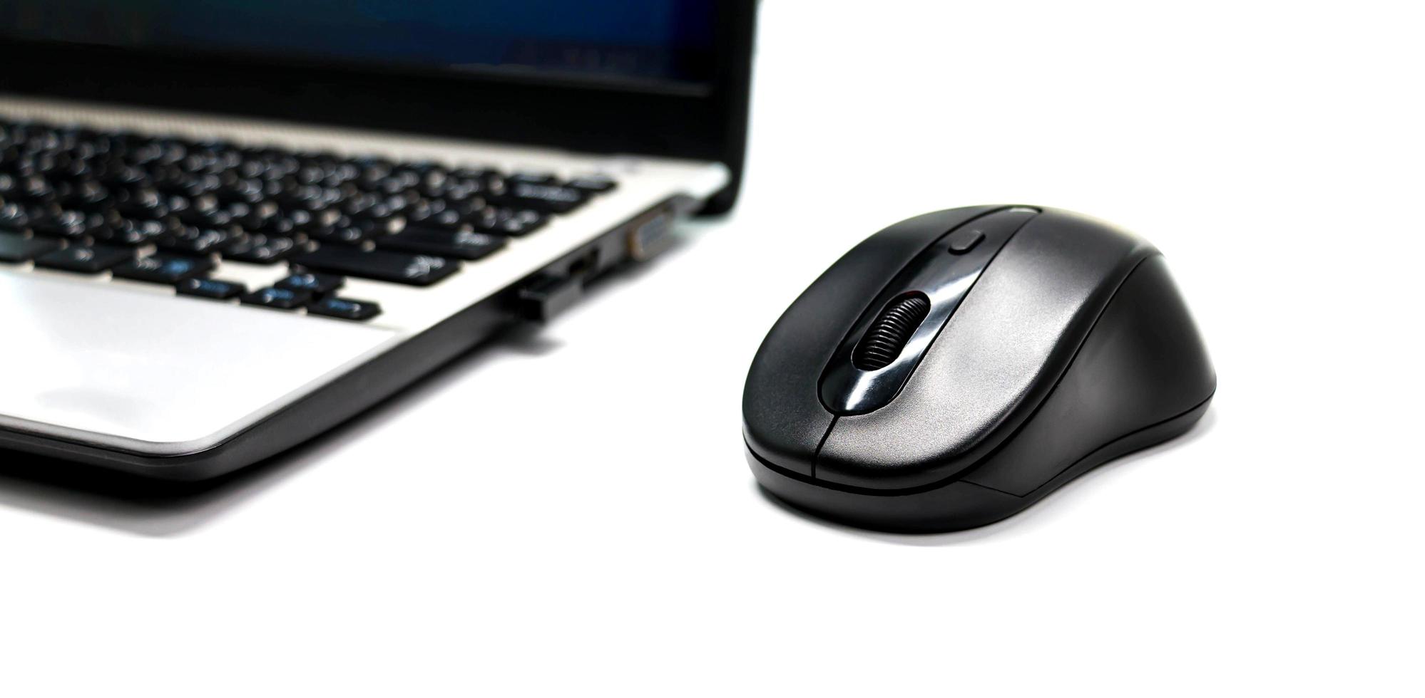 wireless mouse and laptop photo