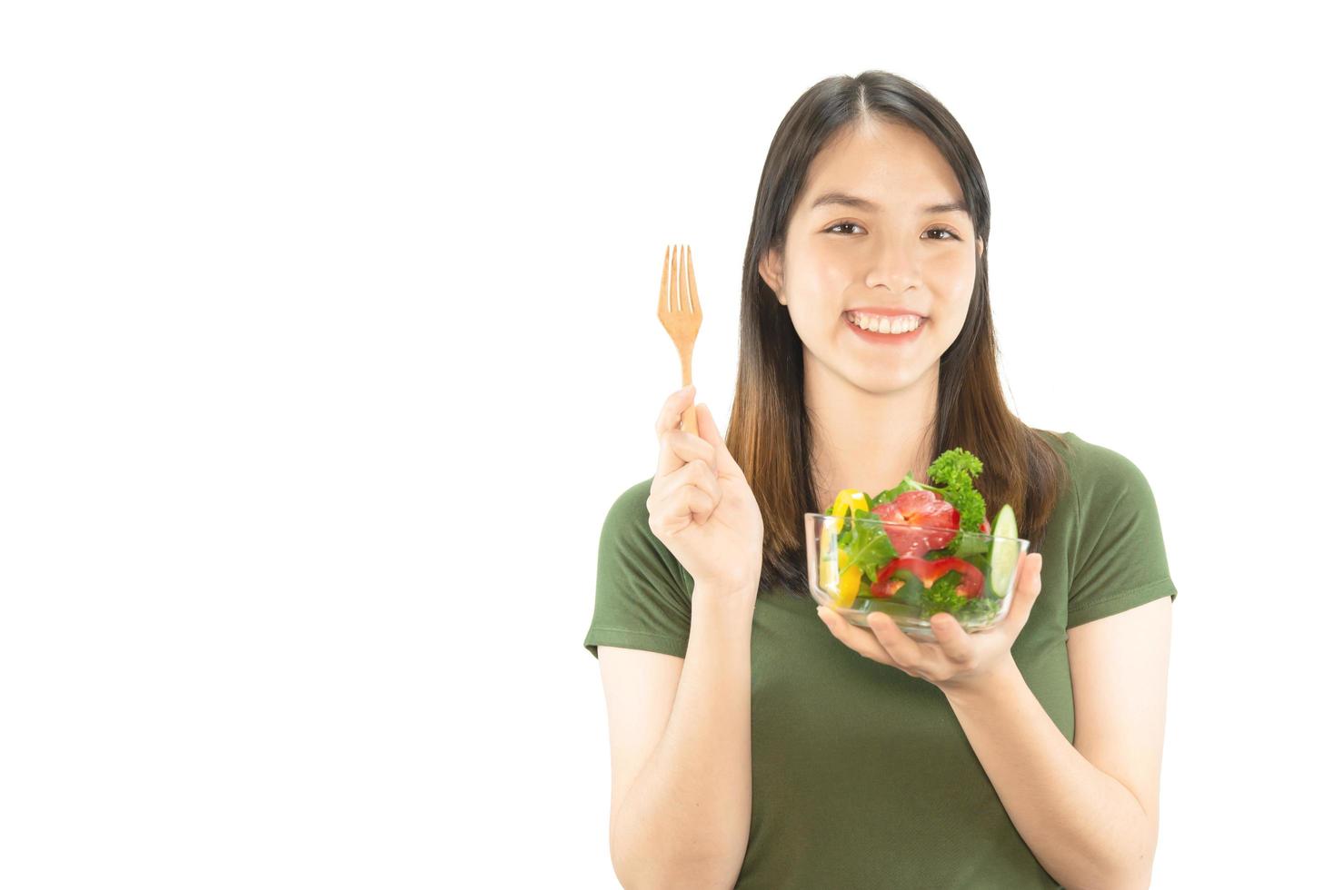 Happy lady holding kichen stuff over copy space background - people home made food preparation concept photo