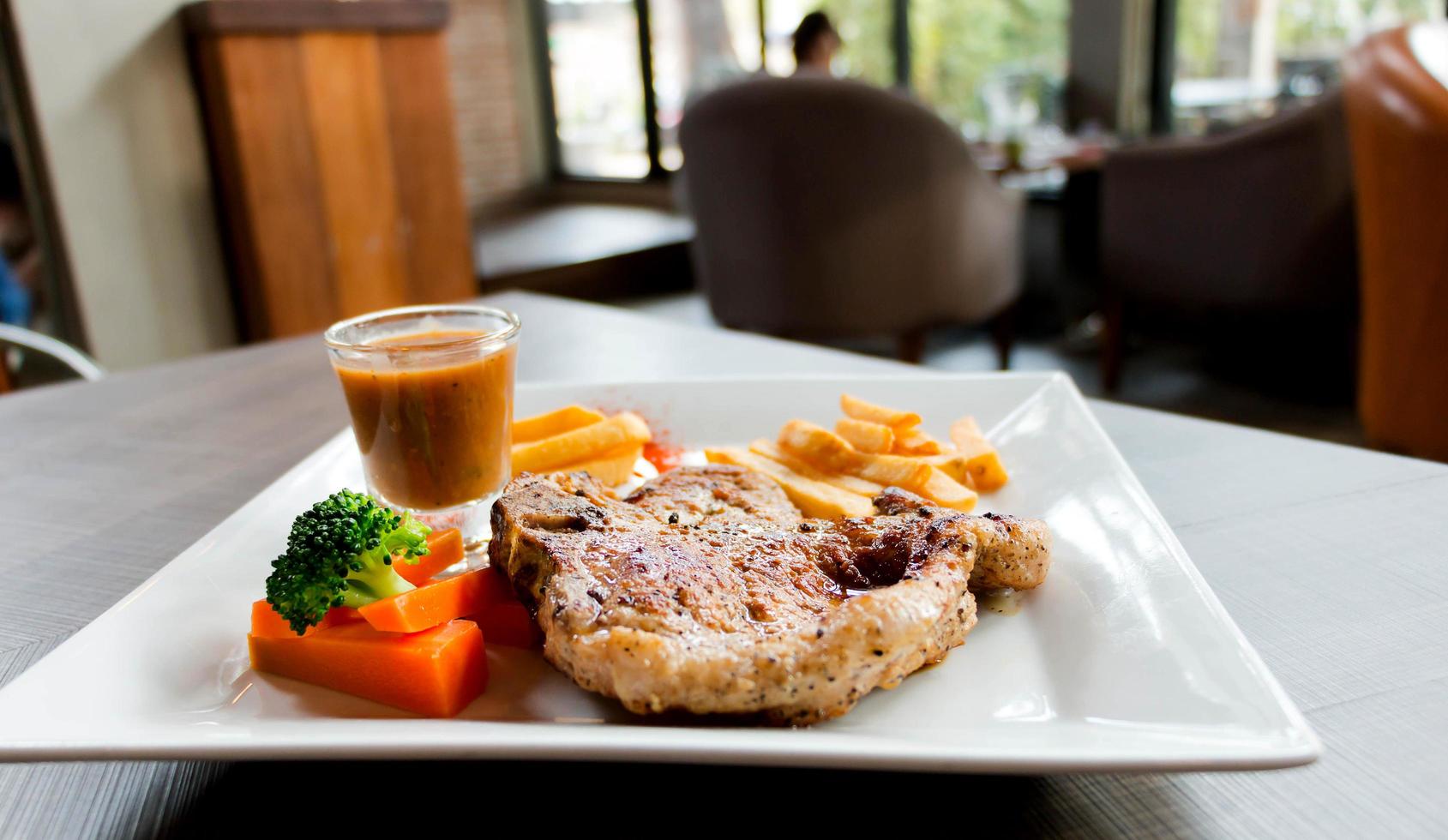 pork chop dish in restaurant photo
