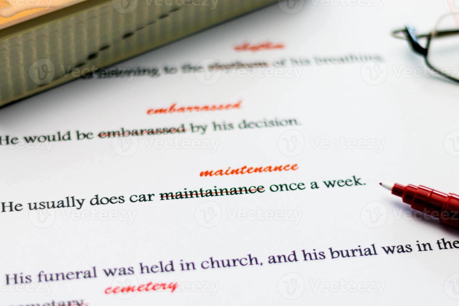 english spelling correction sheet on table photo