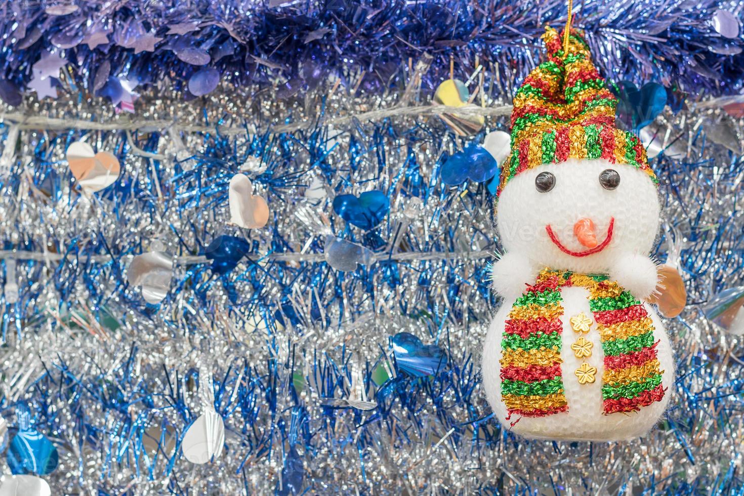 Snowman and tinsel  holiday background photo