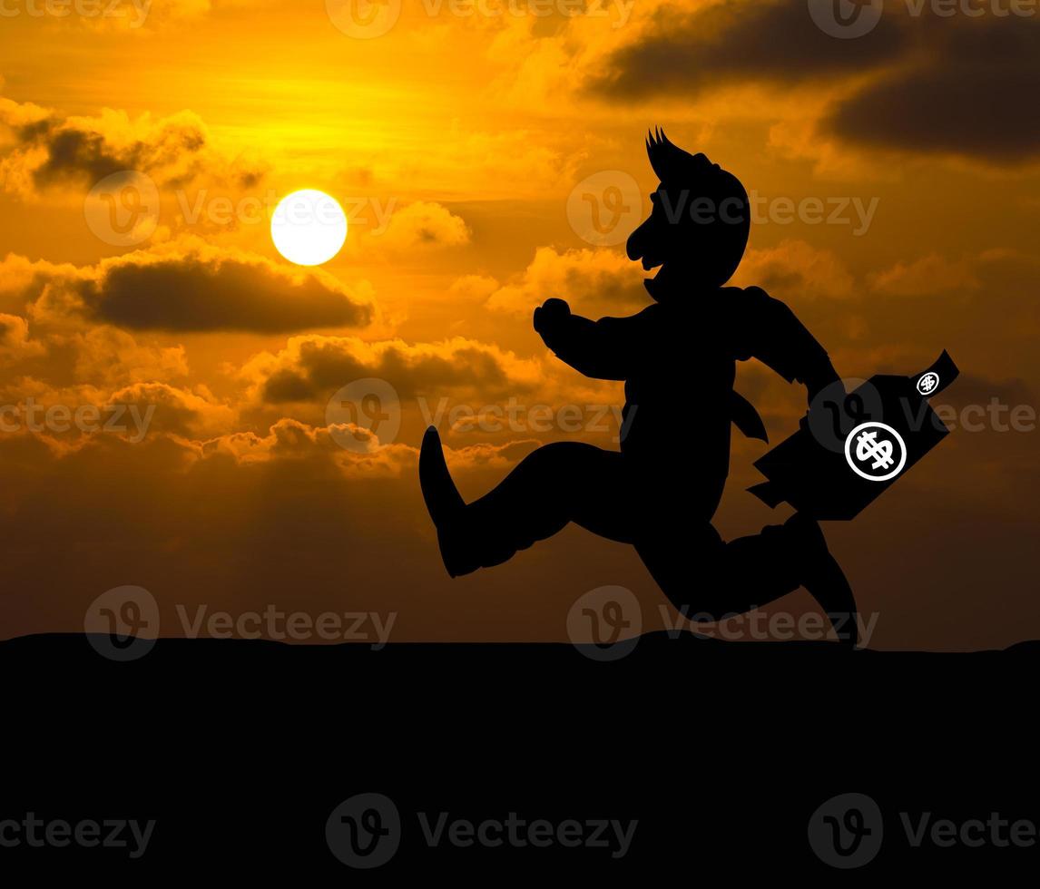 Cartoon Business silhouette concept,Businessman running on the way to success with briefcase at sunset photo