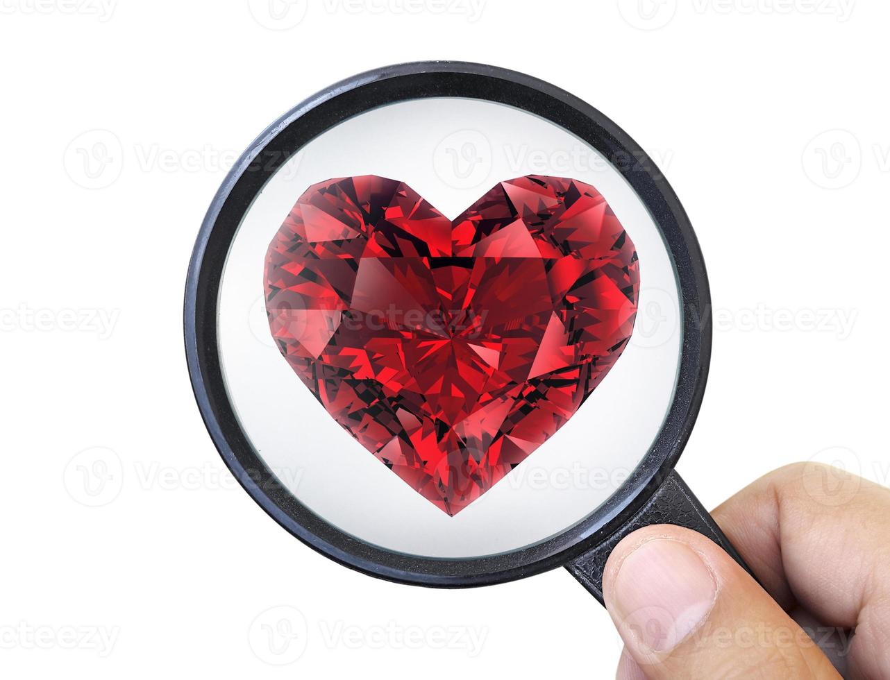 Gem stones. Jeweller checking polished diamond. red heart shaped diamond. Diamond trading and dealing. Loose diamond grading. Precious stones photo
