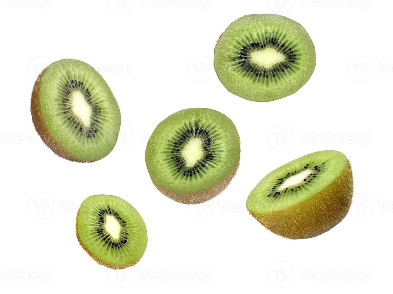 Kiwi fruit levitating on a white background photo