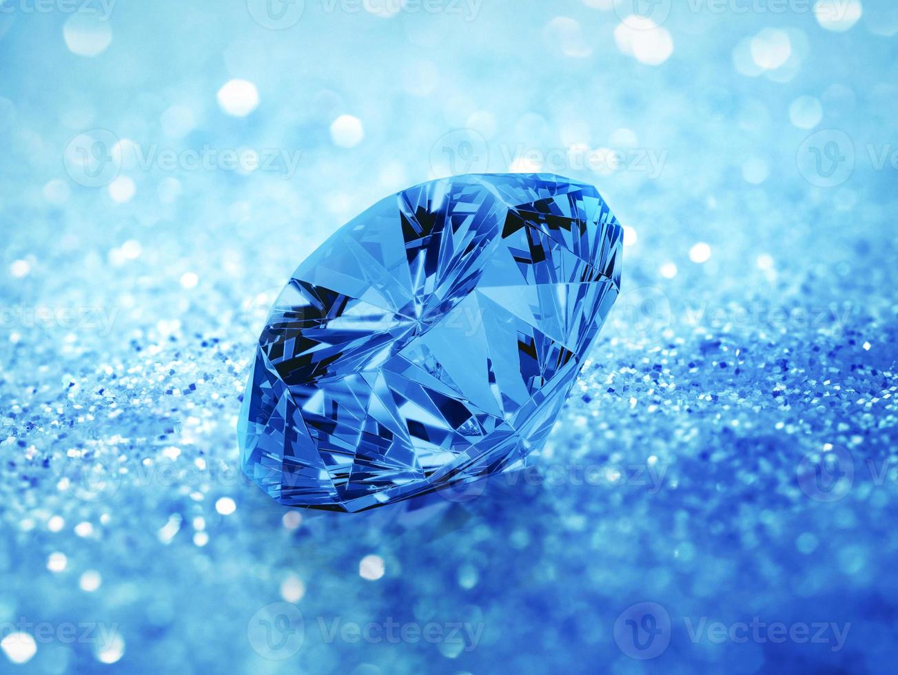 Blue dazzling diamond on blue shining bokeh background. concept for chossing best diamond gem design photo