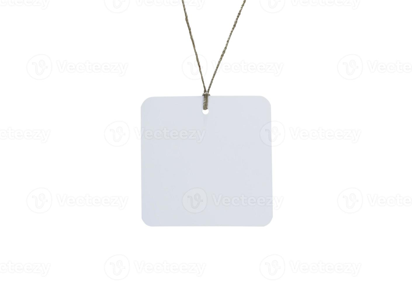 Blank tag tied for hang on product for show price or discount isolate on white background with clipping path photo