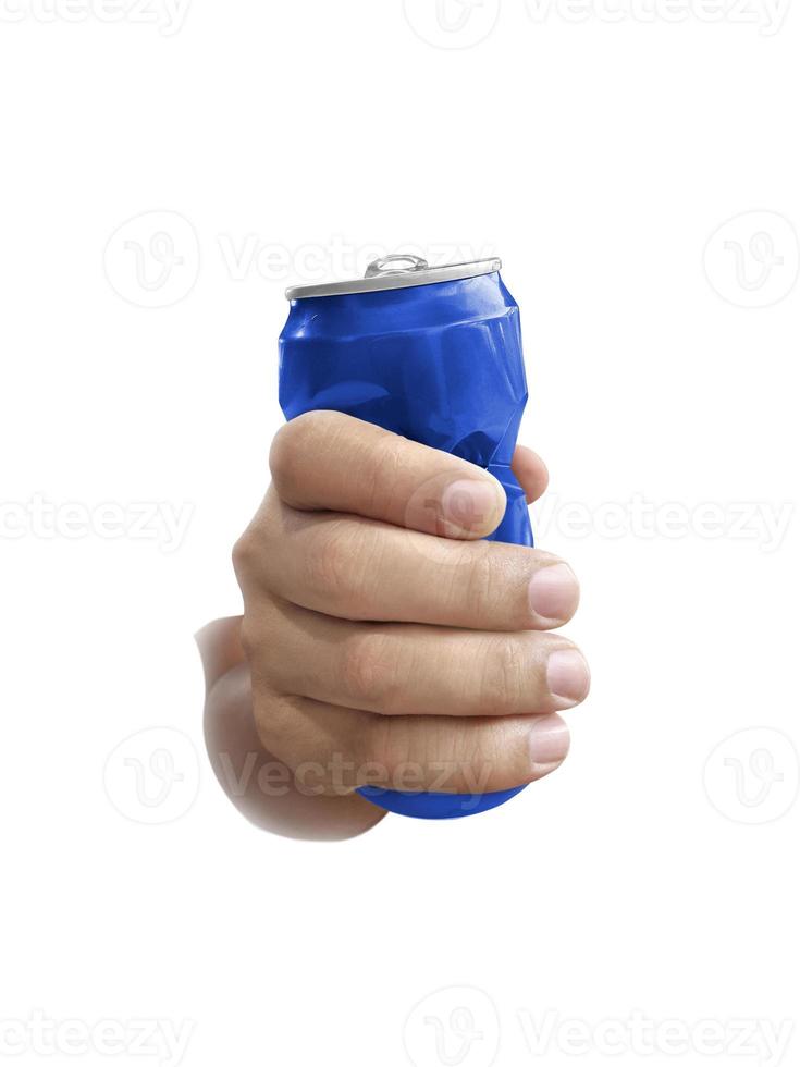 Compressed cans in hand isolated on white background photo
