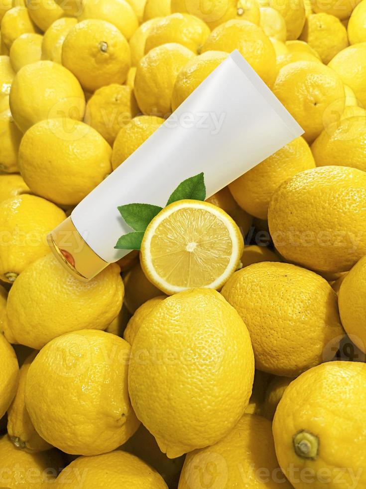 Natural vitamin c skincare products fresh juicy lemon fruit slice and green leaf on lemon background. Cosmetic beauty product branding mock-up for moisturizing cream, lotion, foam or shampoo photo