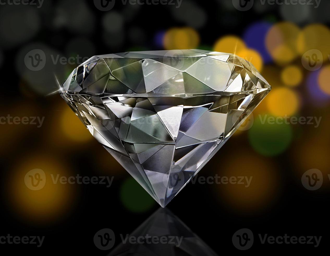 Dazzling diamond on shining bokeh background. concept for chossing best diamond gem design photo