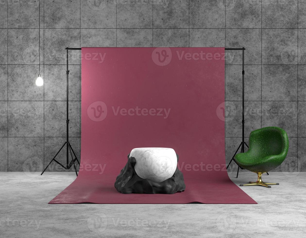 3D rendering interior of a photo studio. Red backdrop on a tripod in a concrete room. Abstract black and white sculpture in the form of a ball and stone, product platform, green armchair lit by lamp.