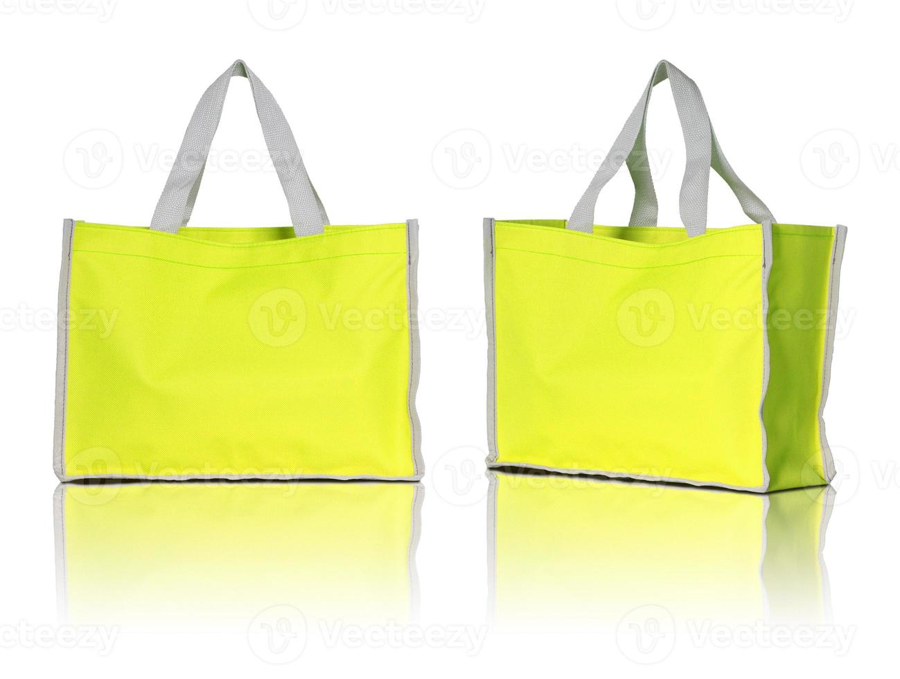 yellow shopping bag on white background photo