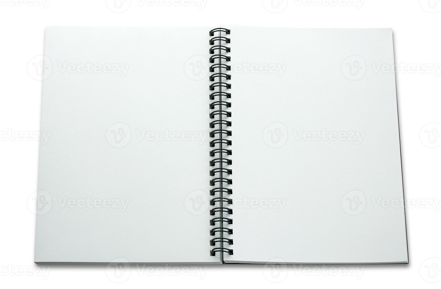 open spiral notebook isolated on white background photo