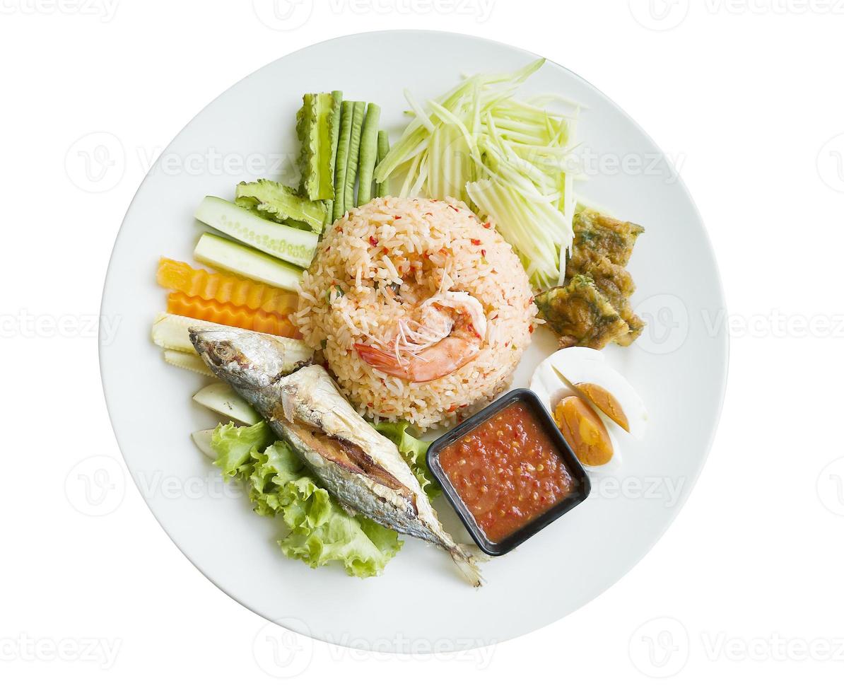 Fried rice with chilli paste and fish on table flat ray photo