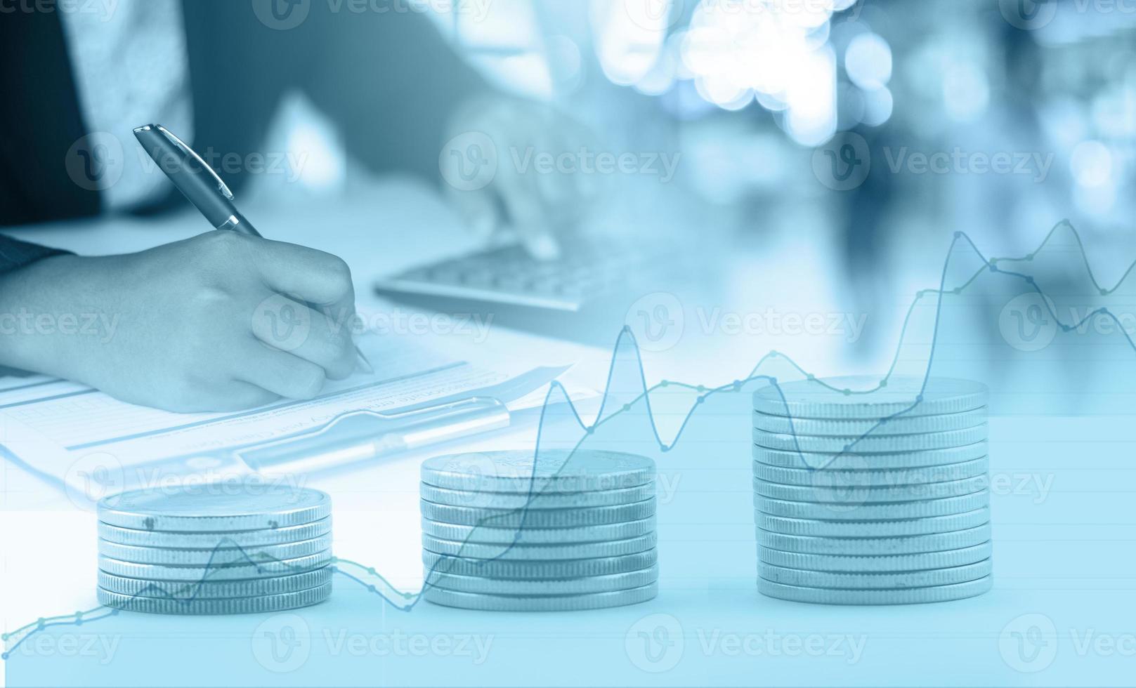 double exposure finance, business, Accountant and coin and graph blue filter photo