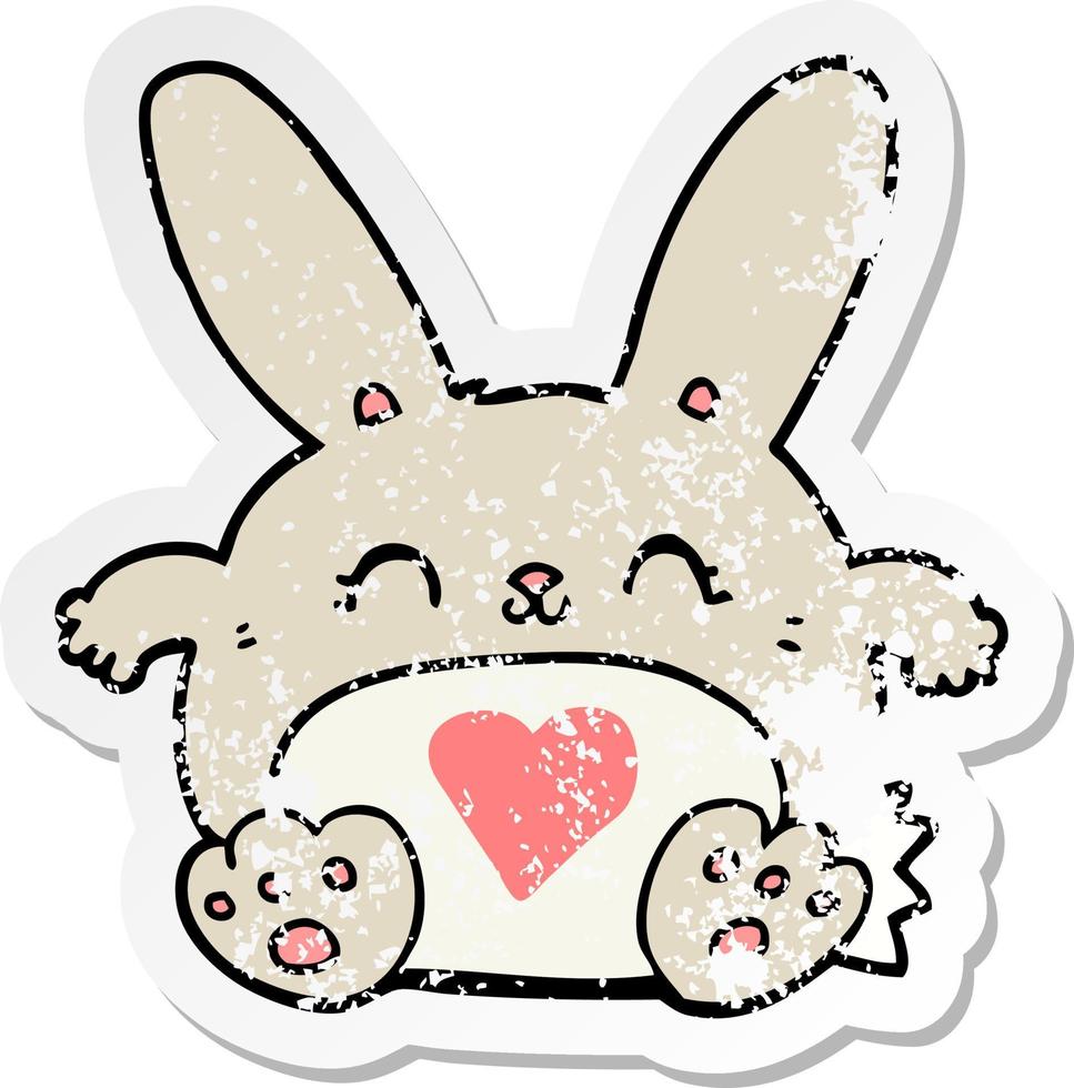 distressed sticker of a cute cartoon rabbit with love heart vector