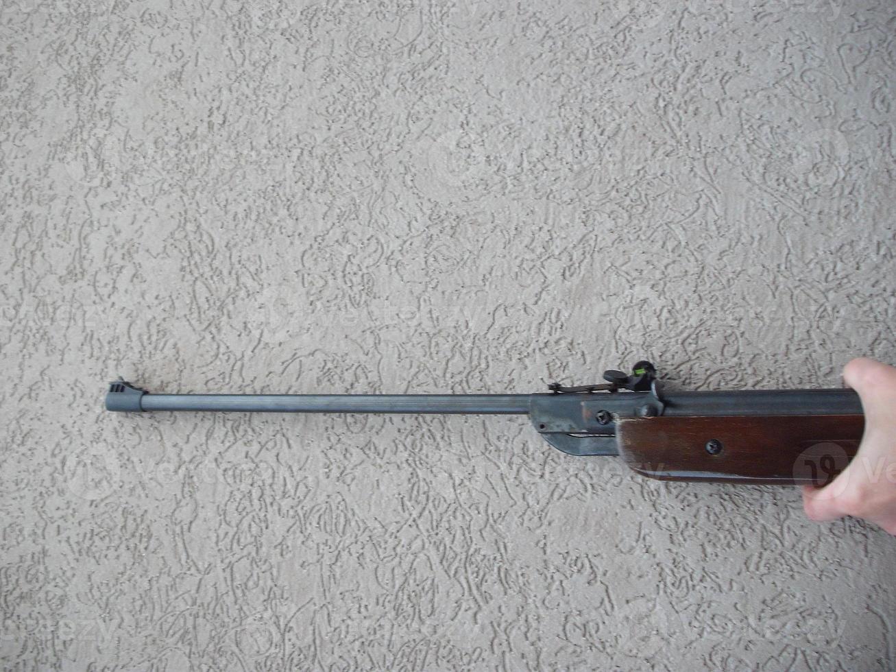 Folding air rifle for firing bullets photo