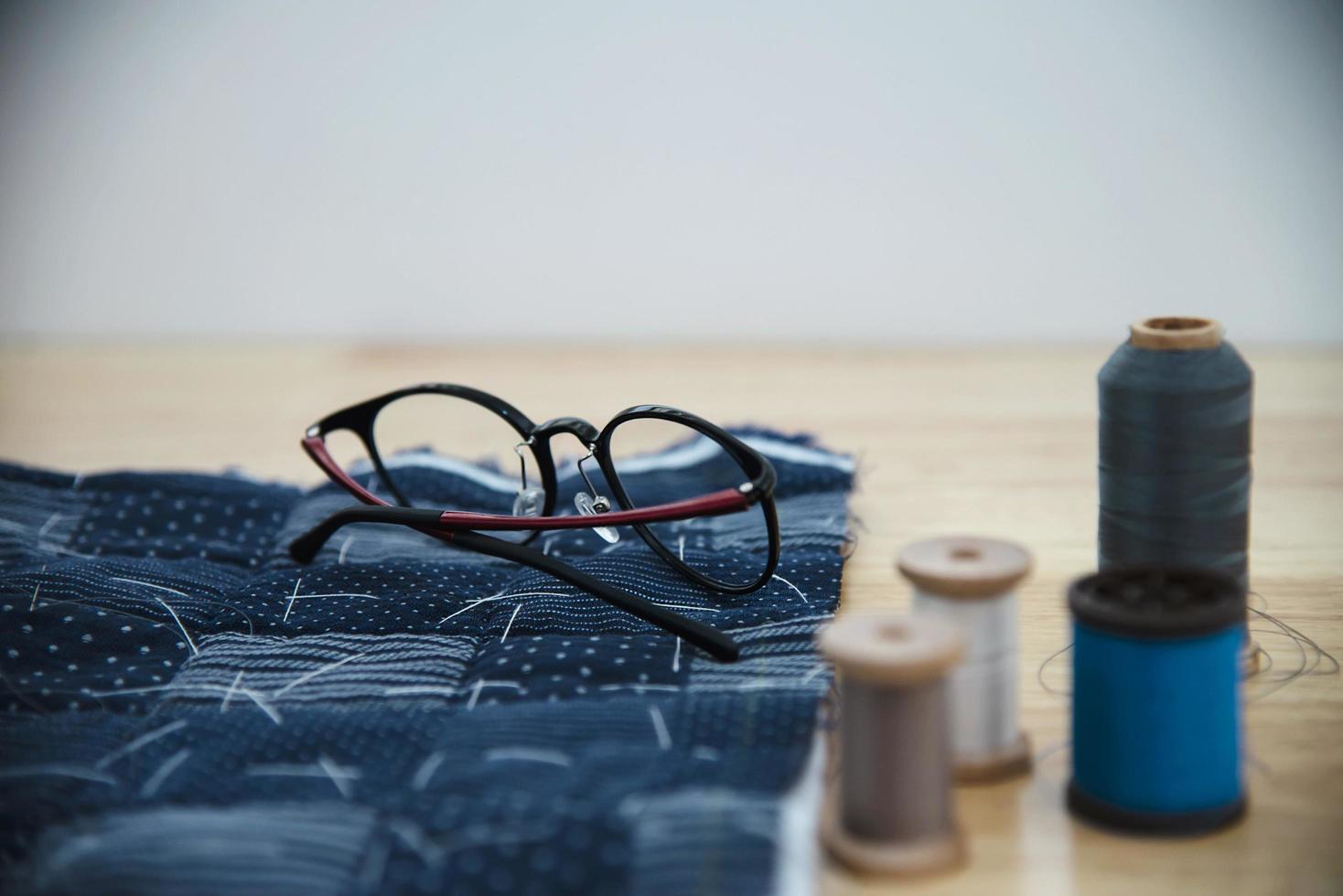 Vintage embroidery set on wooden table background - handmade diy background concept photo