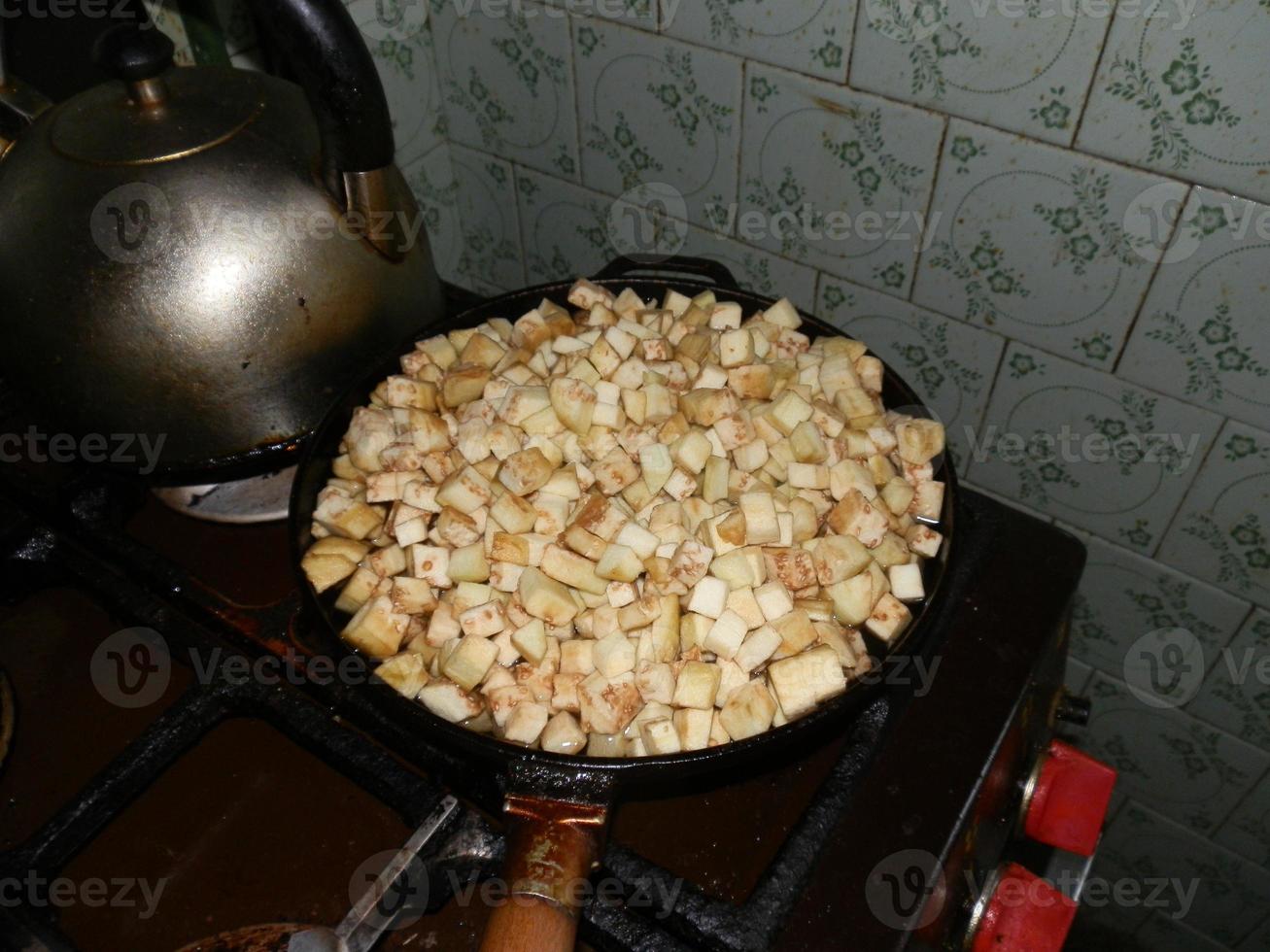 Eggplant vegetable for frying in a pan photo