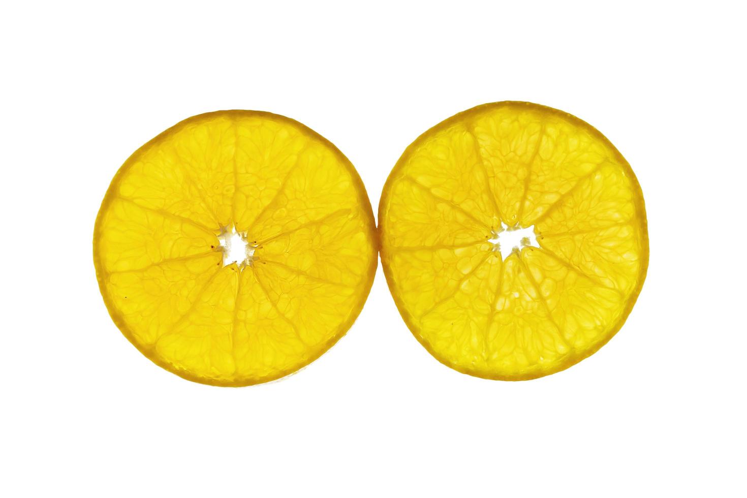 Fresh sliced juicy orange fruit set over white background - tropical orange fruit texture for background use photo