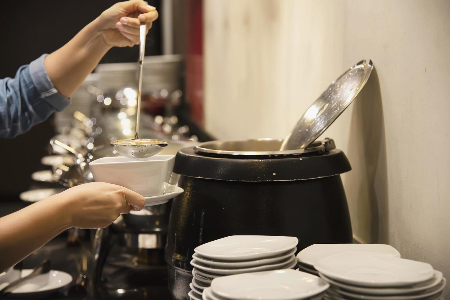 Woman eat the breakfast set in a hotel - people with breakfast in hotel concept photo