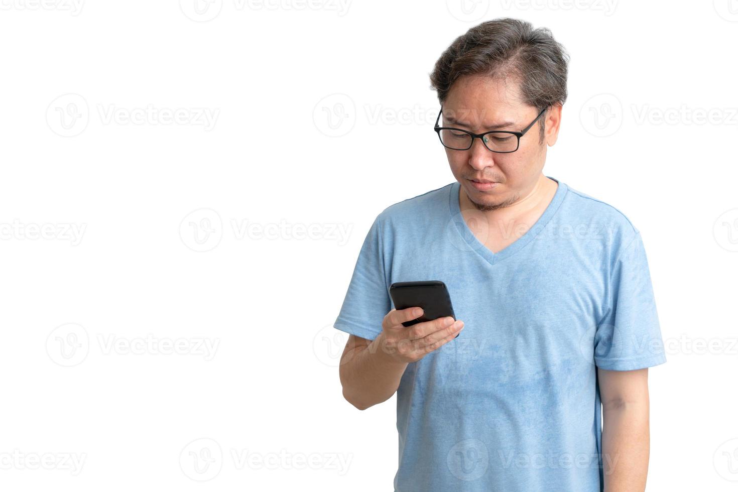 Asian man holding smartphone and stress with copy space on white background photo