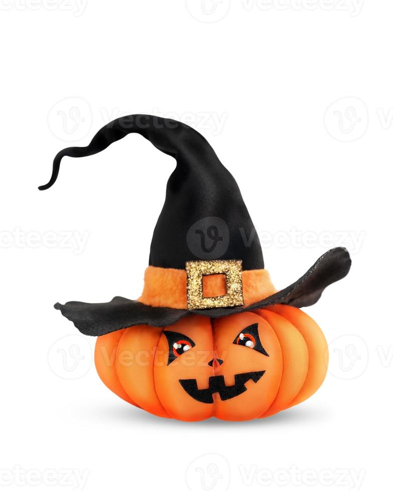 Halloween pumpkin in the witch hat. Isolated. photo