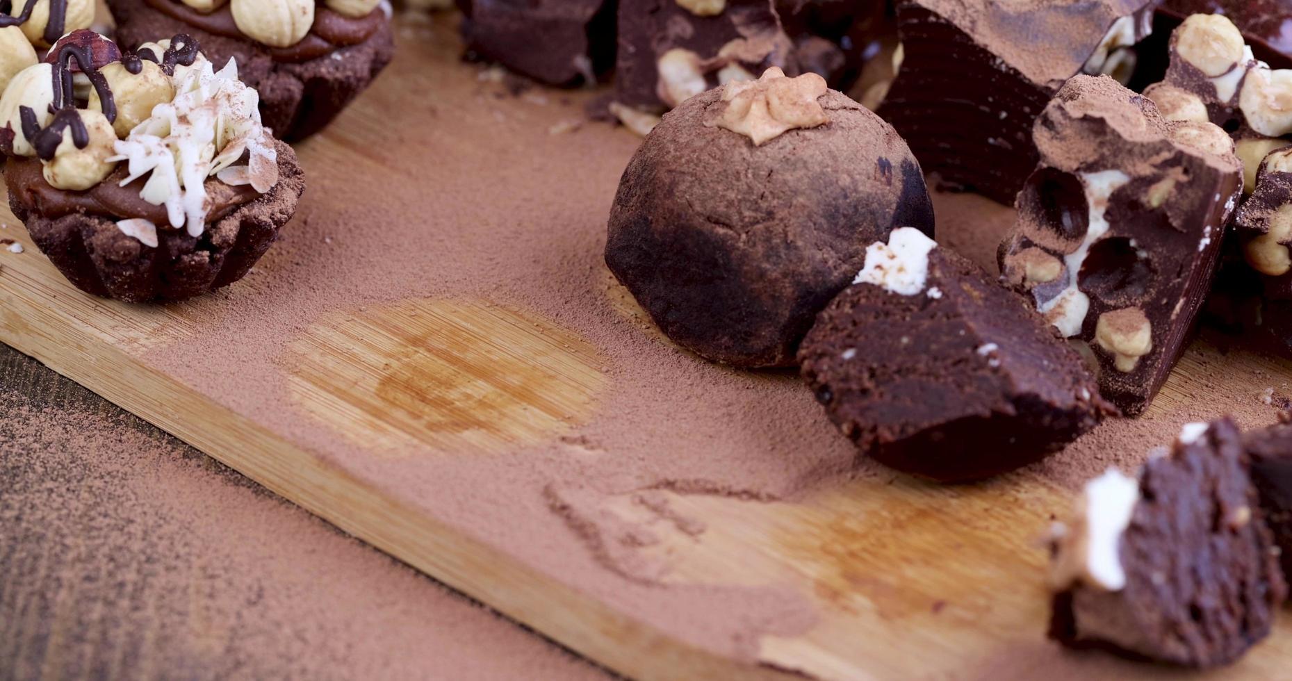 classic Eastern European chocolate cake is placed on the table made of wood photo