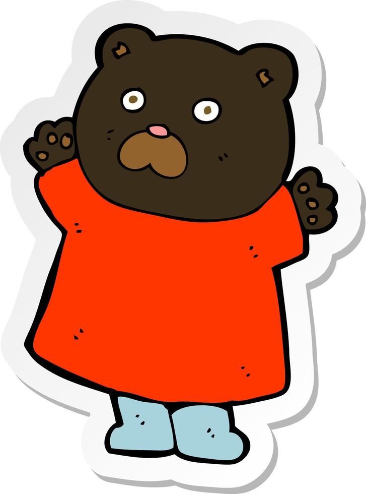 pegatina de un divertido oso negro de dibujos animados vector