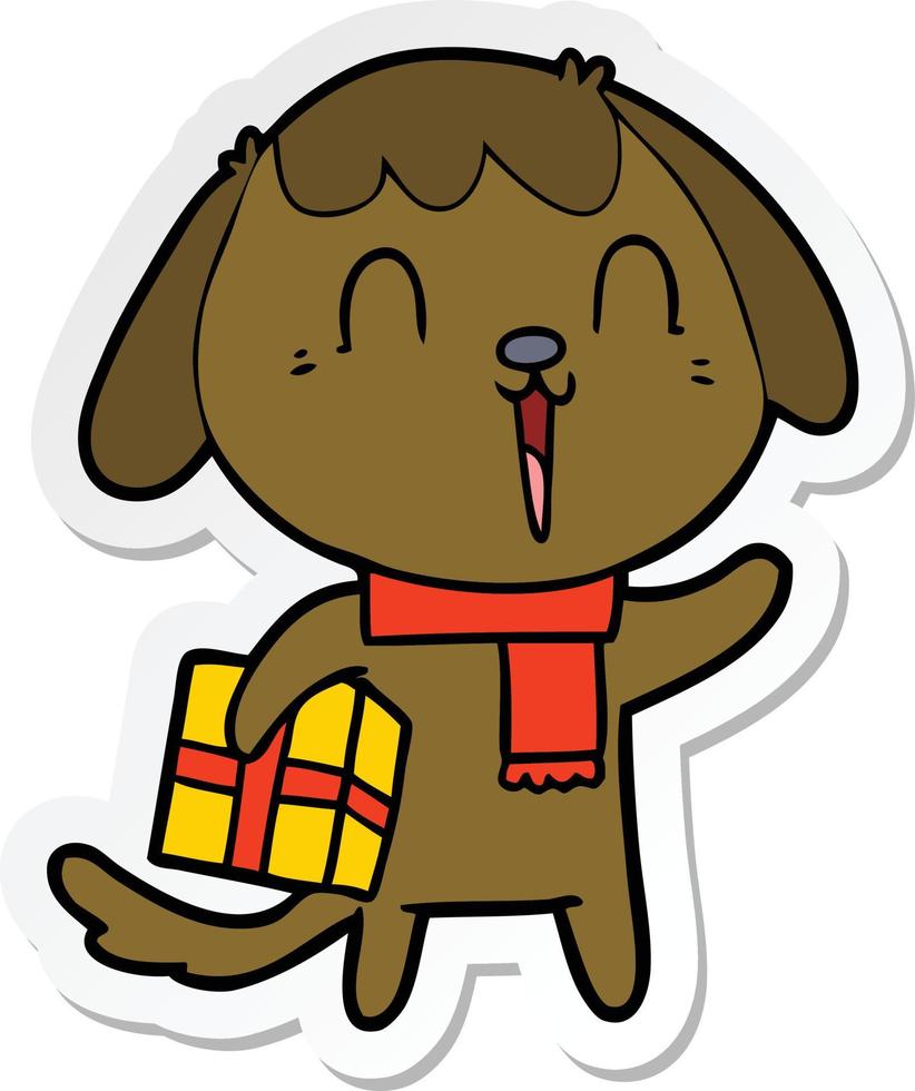 sticker of a cute cartoon dog with christmas present vector