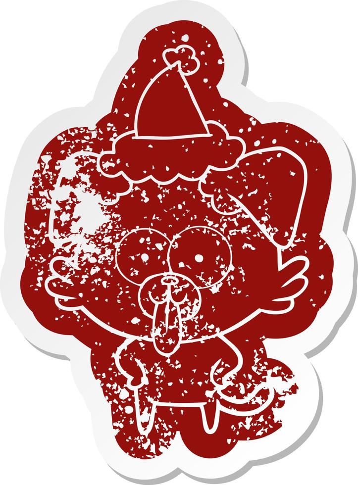 cartoon distressed sticker of a dog with tongue sticking out wearing santa hat vector