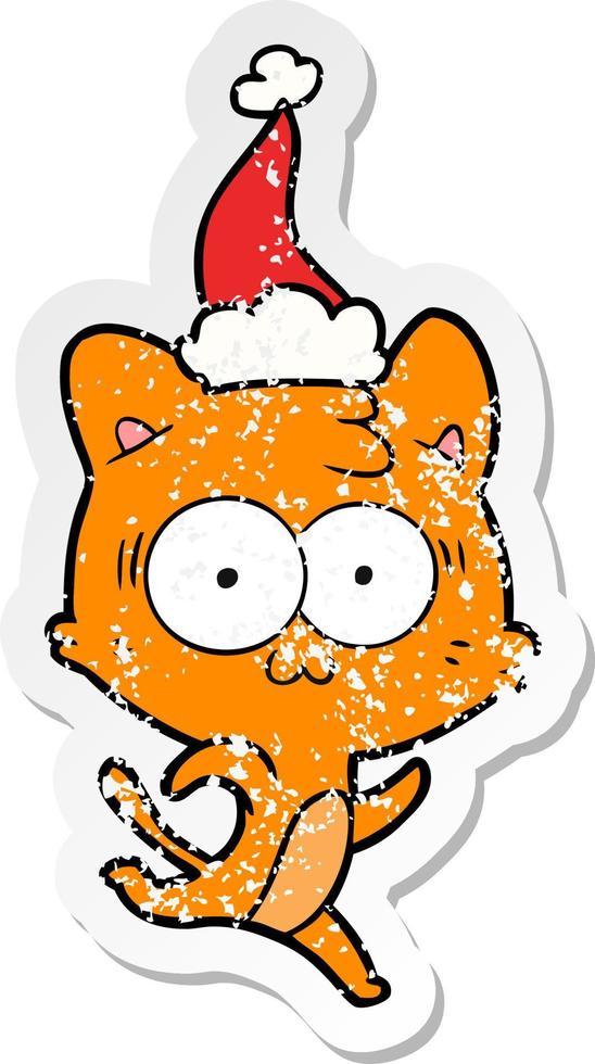 distressed sticker cartoon of a surprised cat running wearing santa hat vector