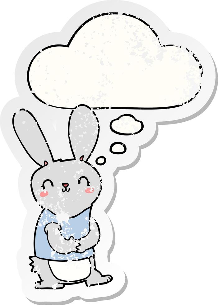 cute cartoon rabbit and thought bubble as a distressed worn sticker vector