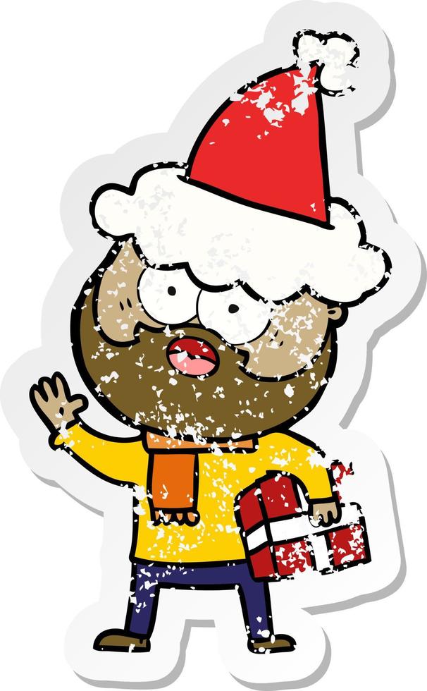 distressed sticker cartoon of a bearded man with present wearing santa hat vector