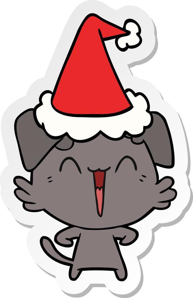 happy little dog sticker cartoon of a wearing santa hat vector