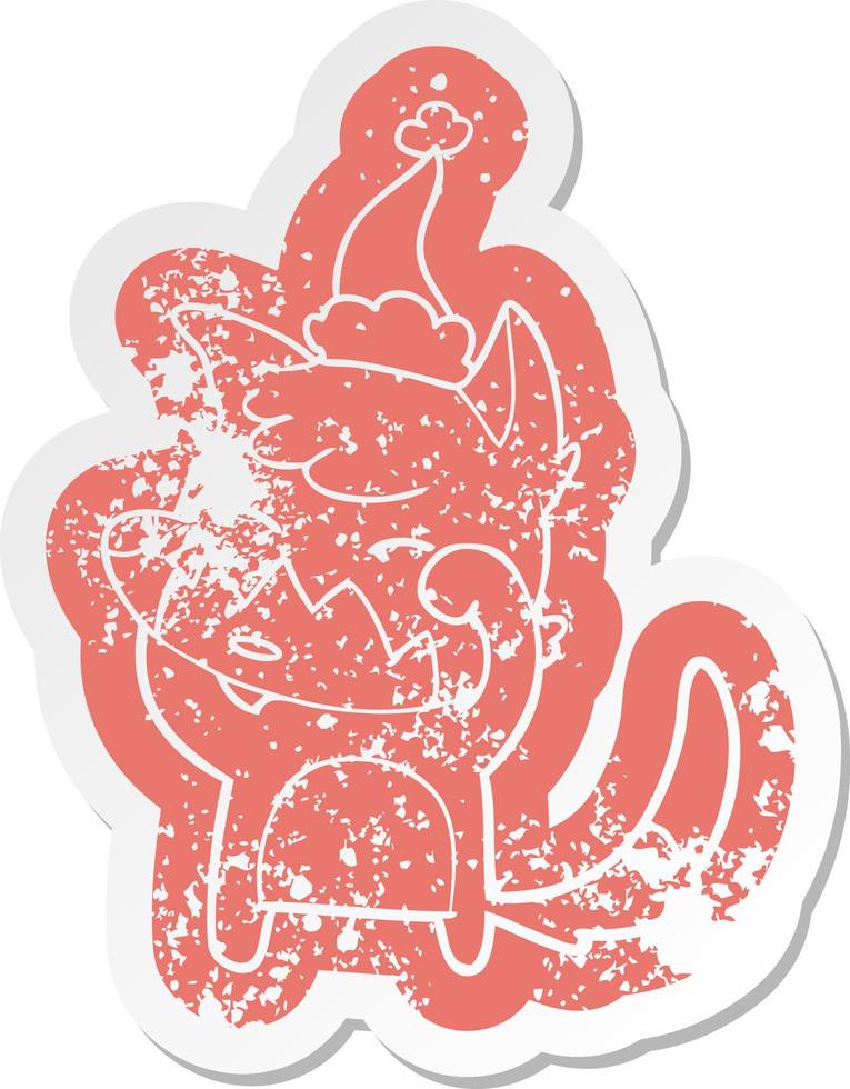 cartoon distressed sticker of a fox wearing santa hat vector