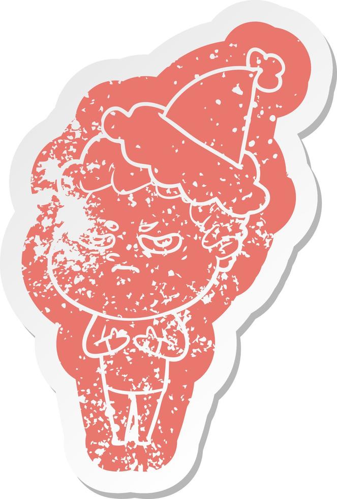 cartoon distressed sticker of a angry man wearing santa hat vector