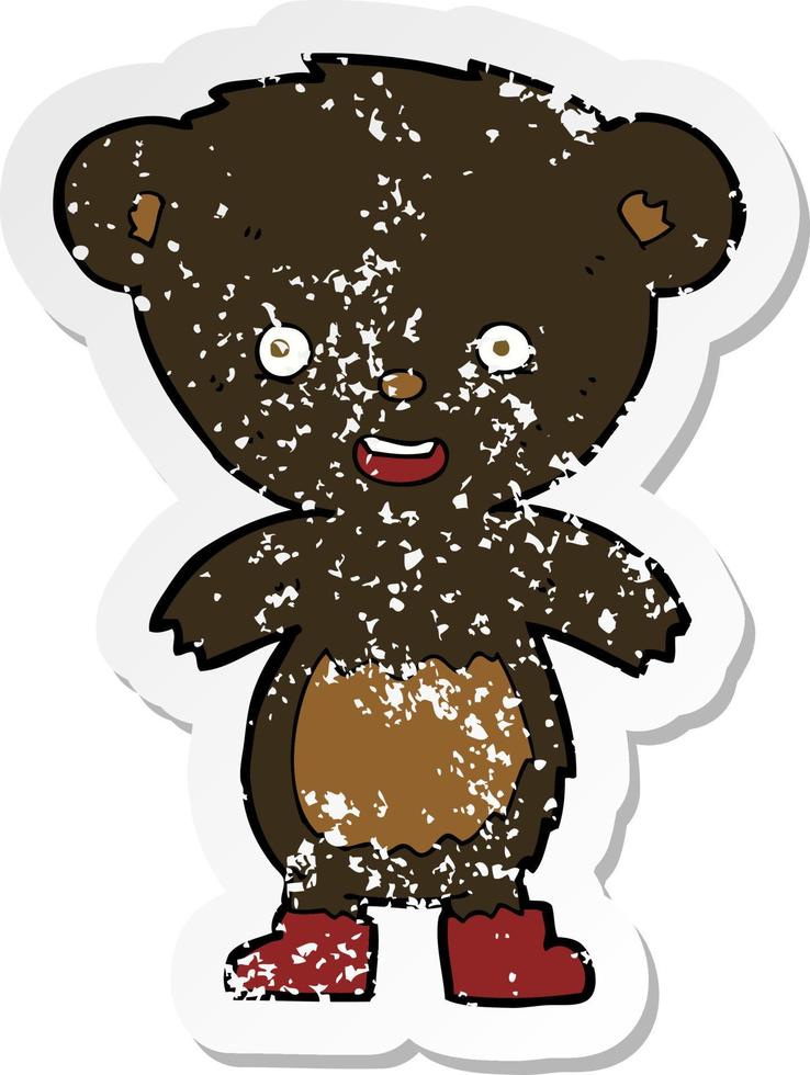 retro distressed sticker of a cartoon black bear cub vector