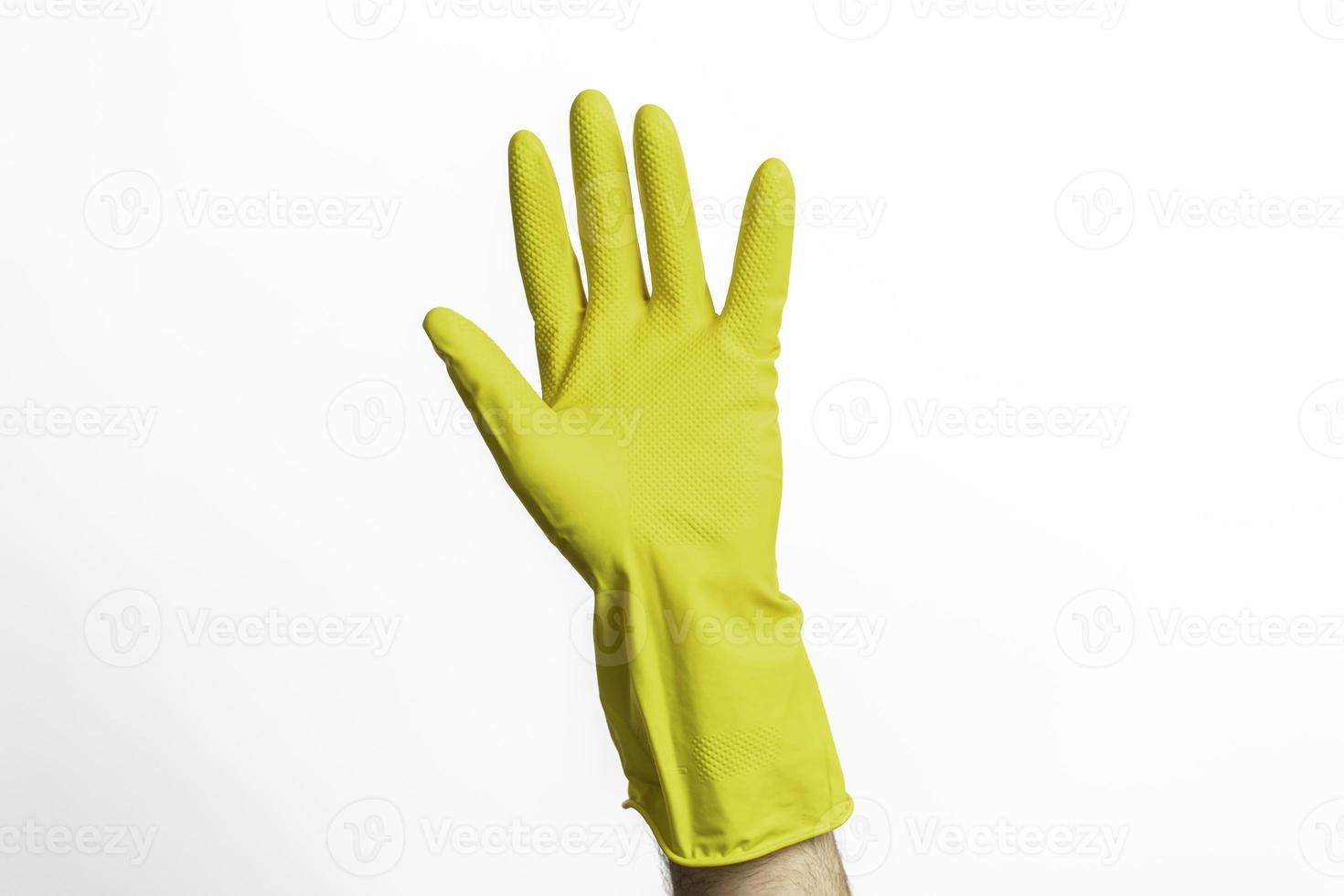 guantes de limpieza amarillos foto