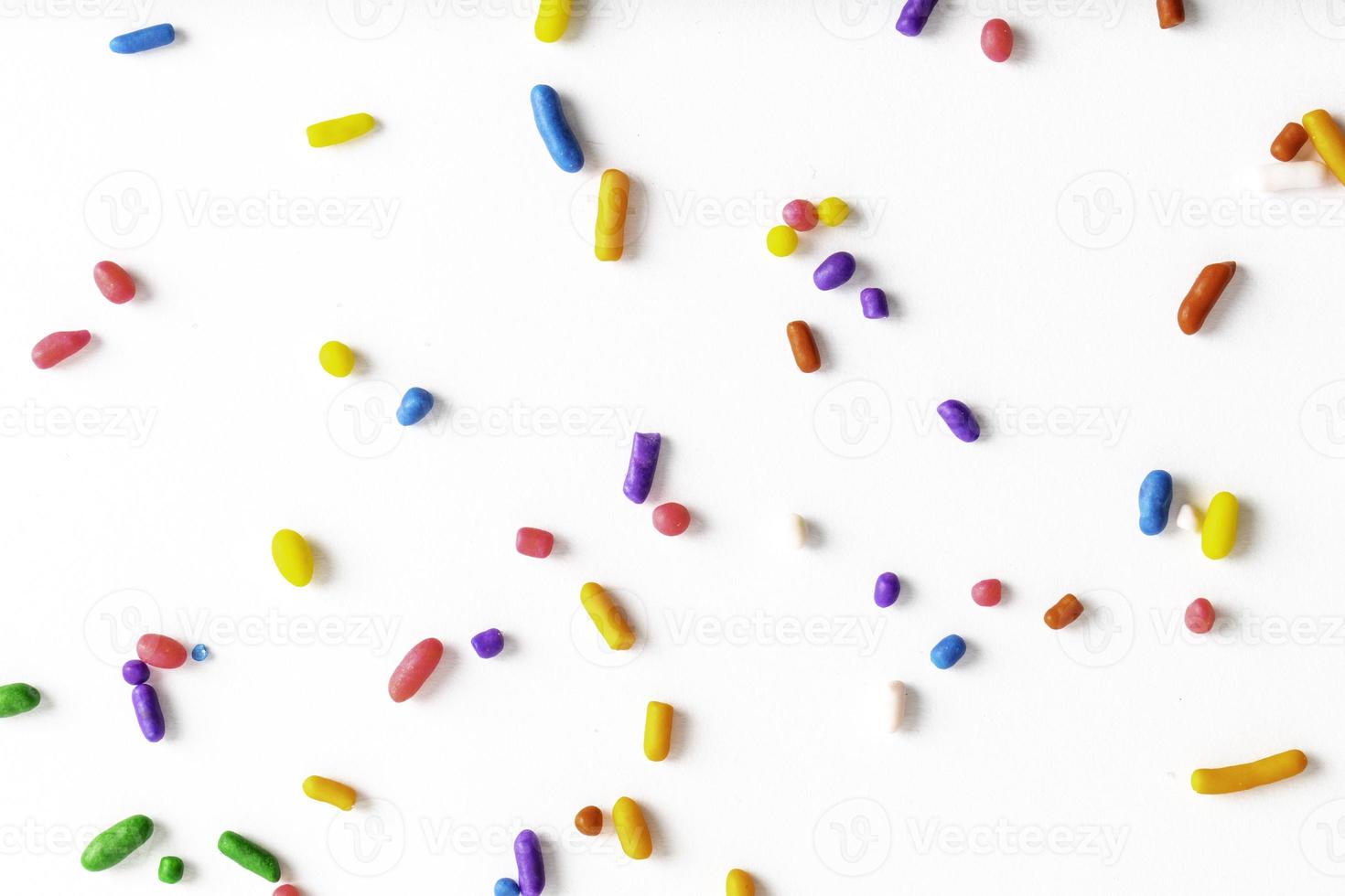Rainbow Sprinkles on White Background 10244678 Stock Photo at Vecteezy