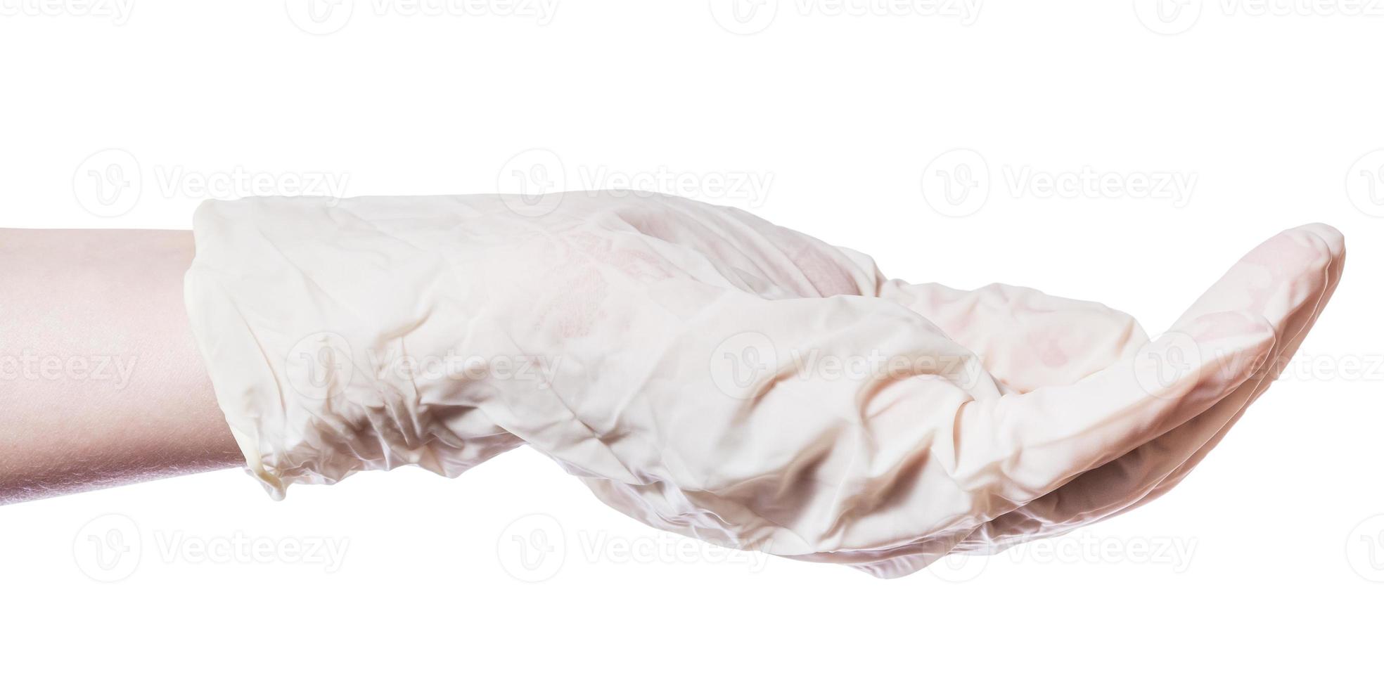 side view of empty handful in palm in latex glove photo