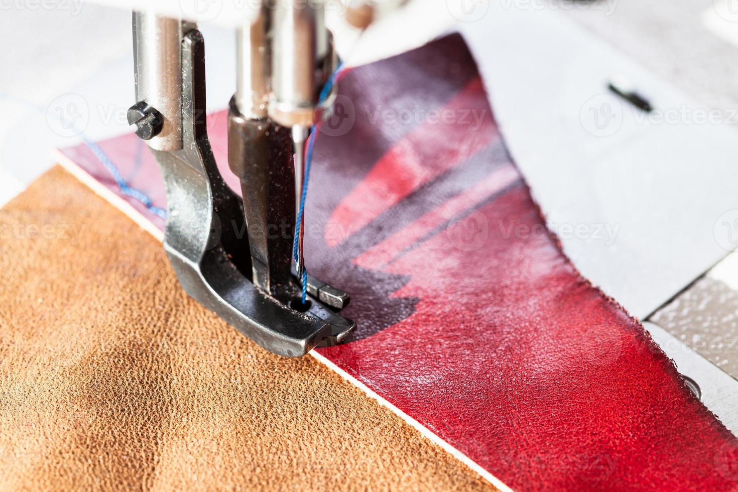sewing machine sews leather pieces 10246487 Stock Photo at Vecteezy