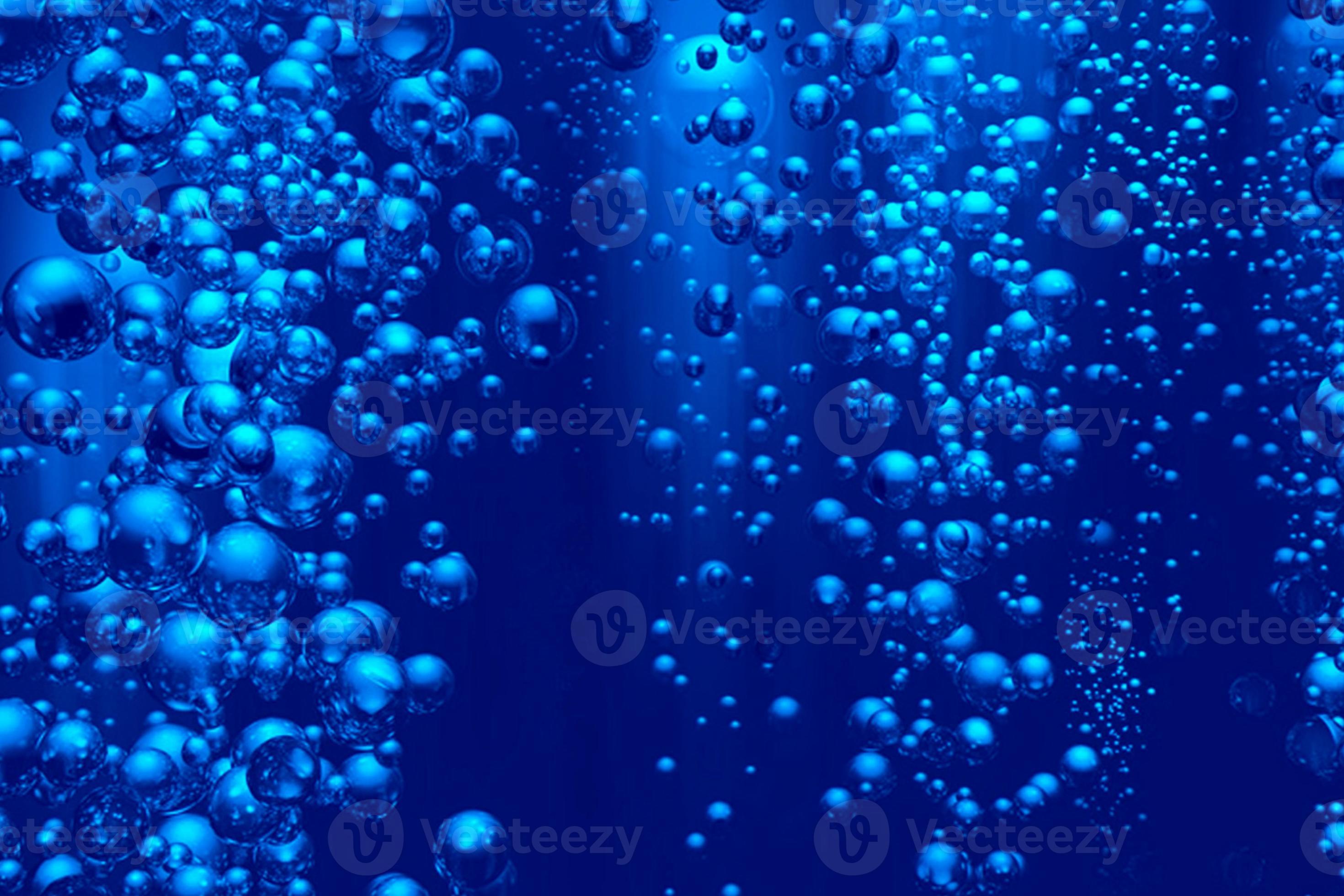 Defocus blurred transparent blue colored clear calm water surface texture  with splashes and bubbles. Bubble water under the sea. Water foam under the  ocean. Blue watercolor with foam and bubbles. 10247241 Stock