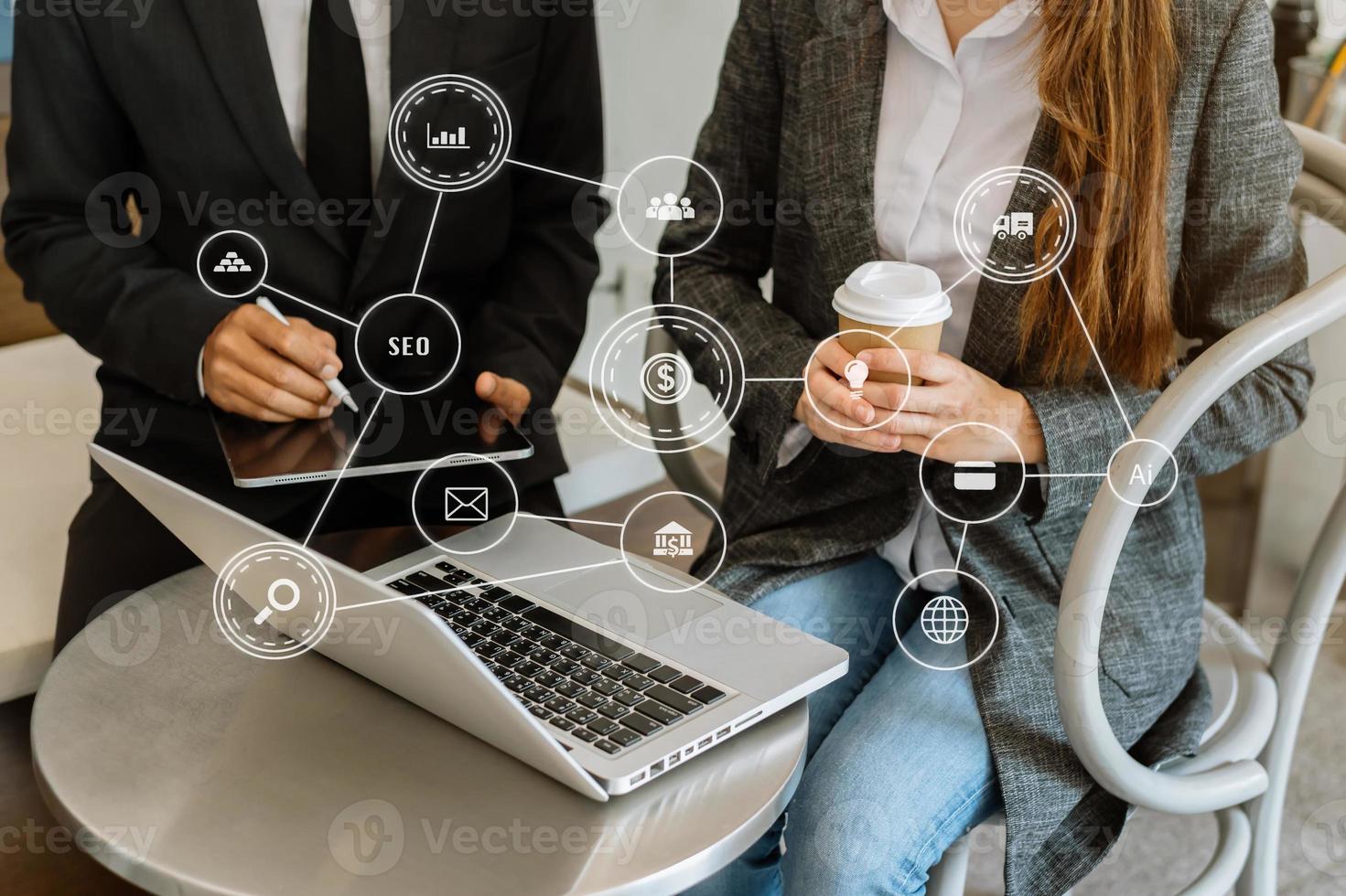 Working team meeting concept, business using laptop and digital tablet with marketing  virtual icon photo