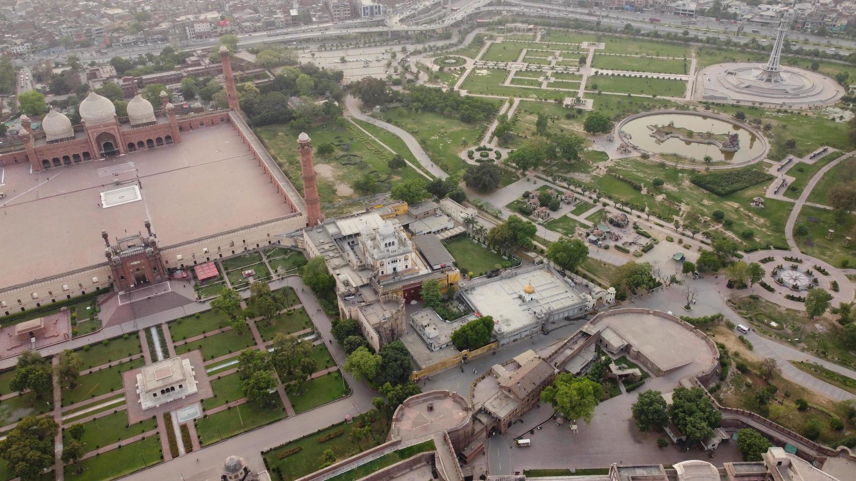 The Royal Mosque at Lahore Pakistan, Drone's High Angle View of Mughal era congregational mosque in Lahore, Punjab Pakistan photo