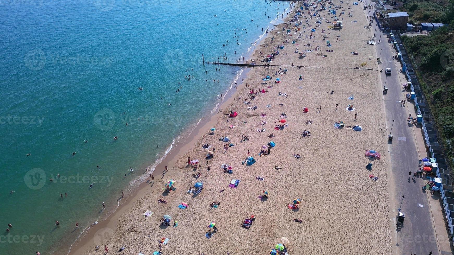 People relaxing at Bournemouth Beach of England UK photo