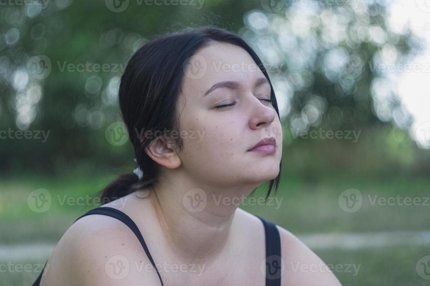 Close up retro portrait of a young Caucasian girl. photo