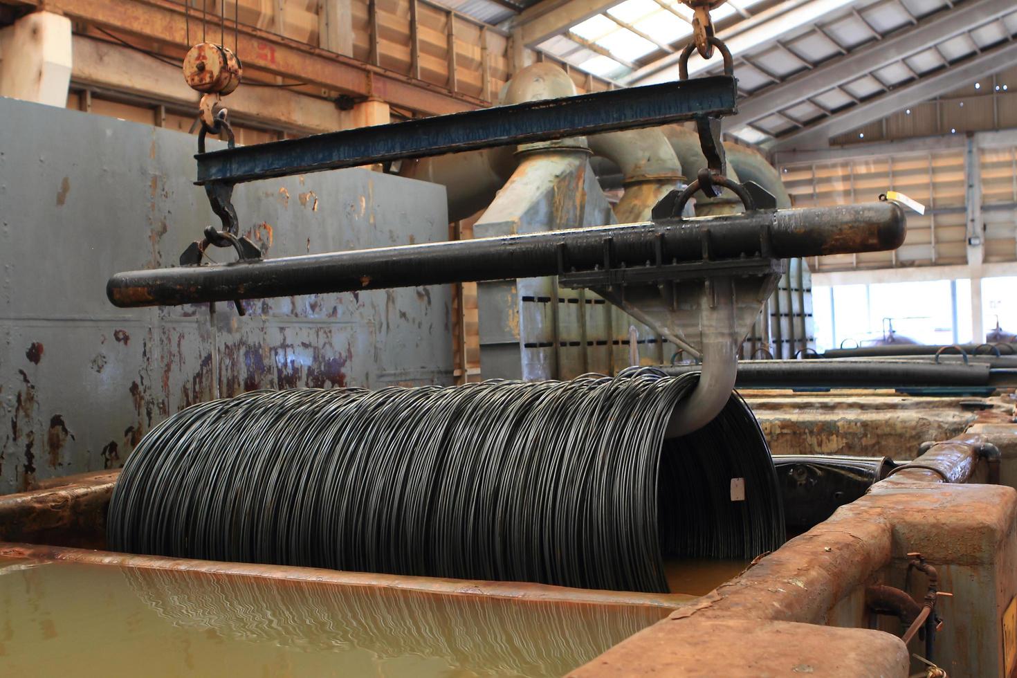 Large spools of Steel Coils being moved. photo