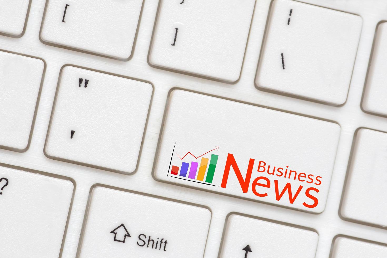 Business News button on Computer Keyboard photo