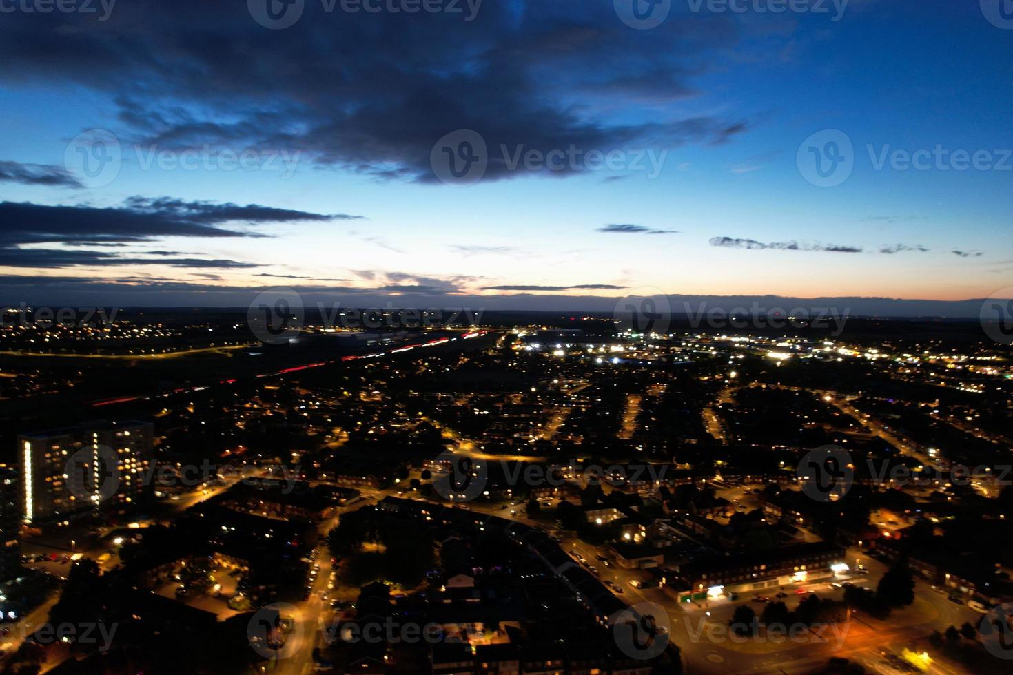 Beautiful Aerial High Angle View of British Motorways and Traffic at Luton Town of England UK at Night after Sunset photo