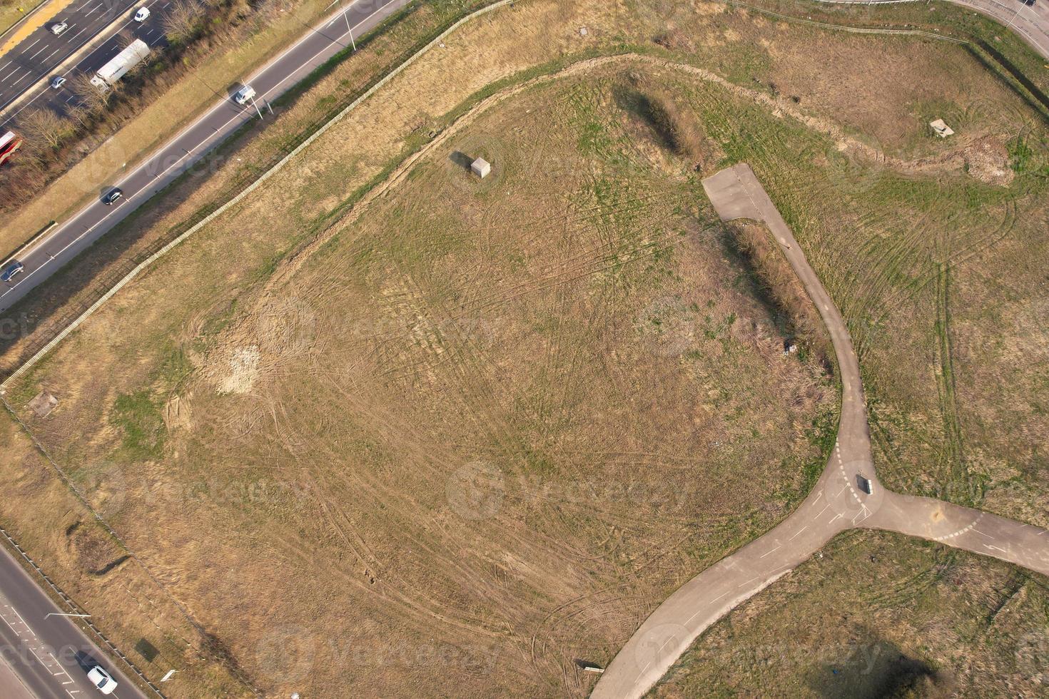 High Angle aerial view of British Roads and Traffic Passing through Luton City and countryside of England UK photo